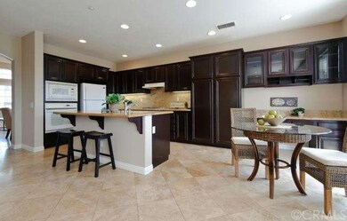 Kitchen opens up to Family Room