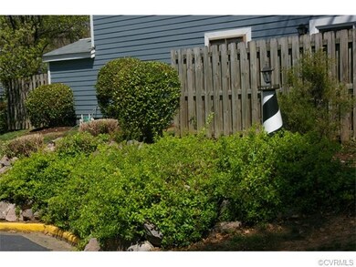 Enclosed side garden.