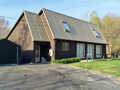 Nice metal roof with 2 skylights...3...