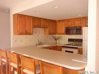 Kitchen. New Corian Counters and tile floor. All A