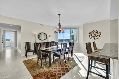 Dining room featuring ornamental molding and an in