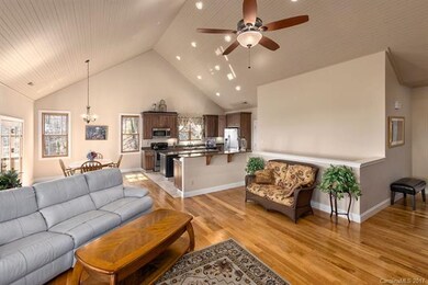Vaulted ceilings, hardwood flooring make this home
