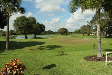 This is your view out the back windows and lanai. The 2nd hole fairway of Coral Oaks Championship course.