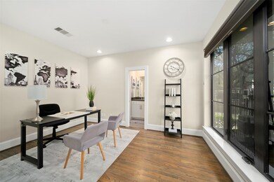 Downstairs features a flex room with an ensuite ba