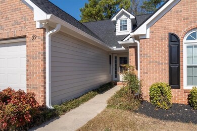 Walkway to front entry.  Exterior of home has new paint.