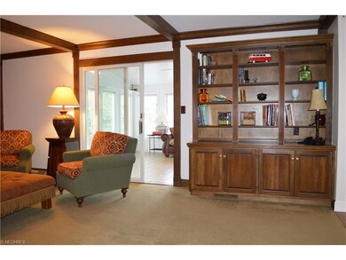 Family room features custom built-ins.  Opening th