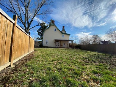 The rear yard is completely fenced with a gate to 
