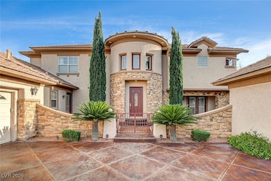 Front entrance overlooking oversized driveway and