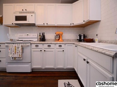 Remodeled kitchen with a cute drop zone @ the back door.