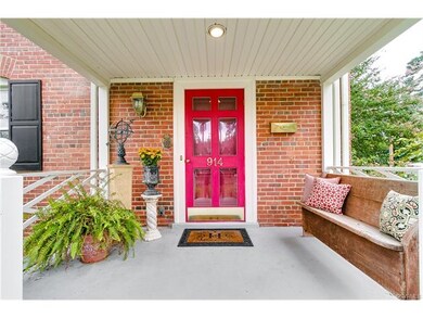 The inviting front porch is spacious and welcoming.