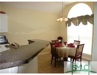 Kitchen. Breakfast bar for meals on the run or sun