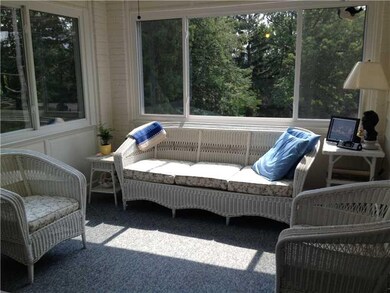 Sunroom. Right off the dining room.  Brightens any