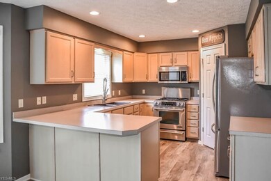 Updated kitchen with stainless steel appliances an