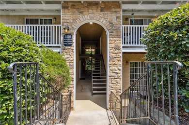 Property entrance with stone siding