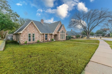 Another front view of the home featuring sidewalks