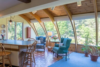 Sunroom overlooks the back yard
