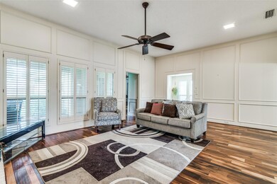 Main living area with fireplace opens to breakfast
