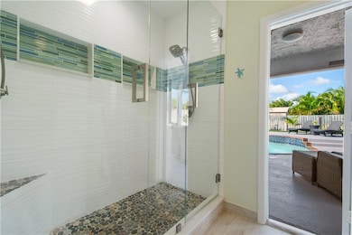 Master bath with separate shower area with easy ac