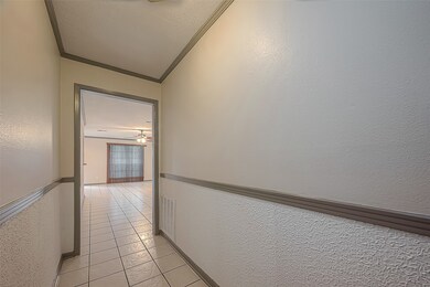 8910 Lazy River Ln, Houston, TX 77088 - photo 4