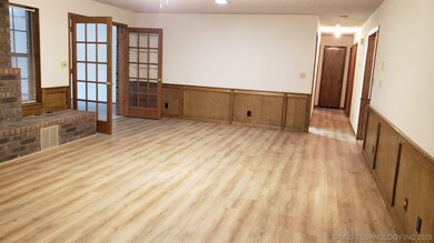 Living room looking from dining area. Hall to bedr