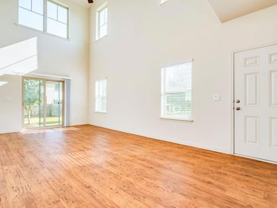 Unfurnished living room featuring light wood-styl