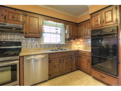 Quiet clean look Kenmore Elite dishwasher, Double sink and Disposal.