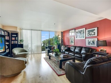 Living room with expansive windows and wood finis