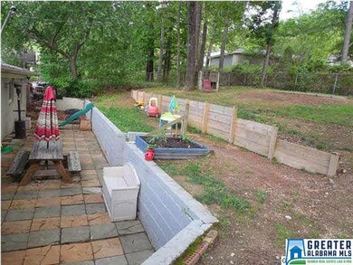 Backyard is tiered so every inch can be used