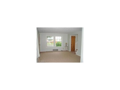 Spacious livingroom has new windows, new paint and