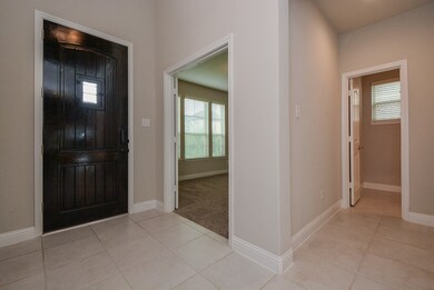 As you enter you will notice the study and the half bath to the left