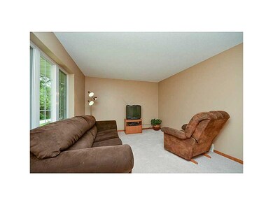 Great Room. New carpet in living room.