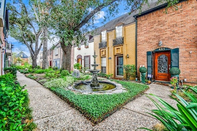 Welcome home to lush landscape and water fountain