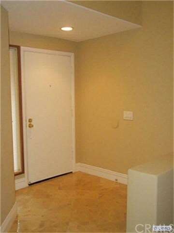 Entry with Travertine Flooring