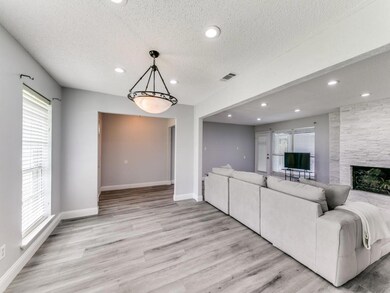 Unfurnished living room with light hardwood / wood