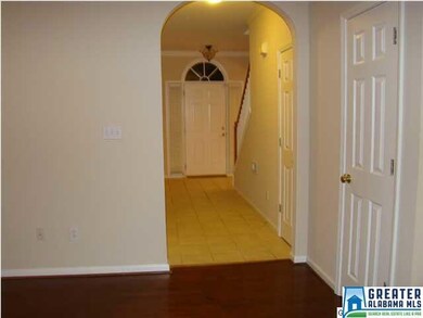 Foyer entrance from family room, arched doorways, 