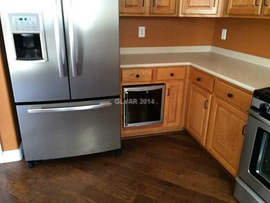 Property Photo. Wine cooler and fridge