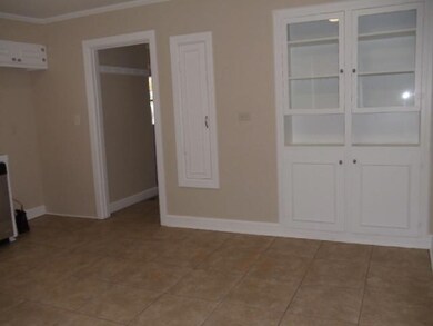 Built in China, new tile flooring & tile counters compliment the kitchen