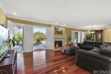 Family room w/ oversized sliding glass doors, plan