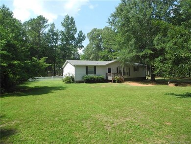 side view from property mid way to home and road
