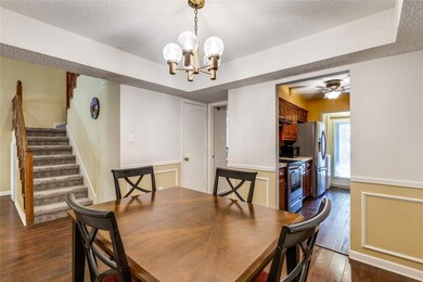 Dining Room and View of Staircase.