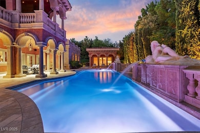 Pool at dusk with an outdoor pool, a patio area, a