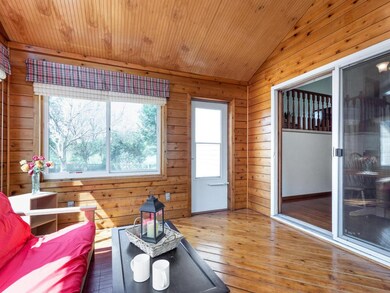 Attractive woodwork surrounds this room.