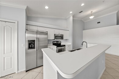Kitchen featuring appliances with stainless steel