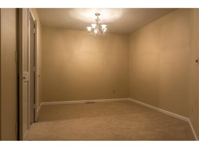 Formal dining room with newer light fixture.  All 