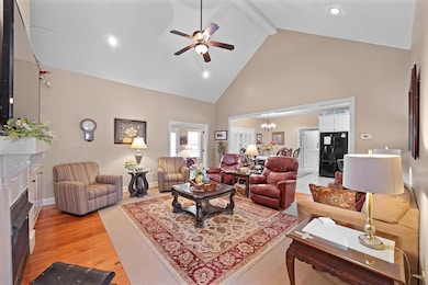 Living room with beam ceiling, high vaulted ceilin