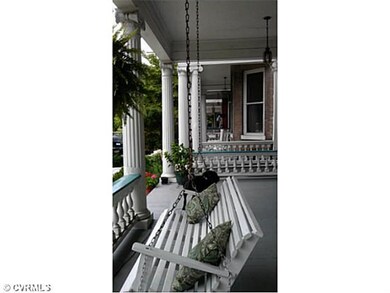 Exterior Front - Front porch is a second living ro