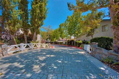 Charming stone bridge as you enter the community. 