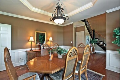 Dining Room has wainscotting and trey ceiling
