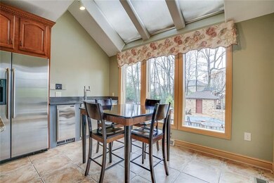 The eat-in kitchen with plenty of skylights and pi