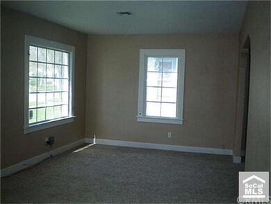 Family Room with Newer Vinyl Windows
